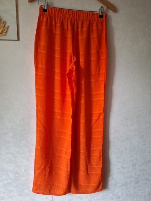 Pomarańczowe spodnie M Resume