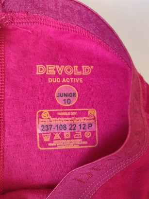 Różowe legginsy Devold 140 z merino